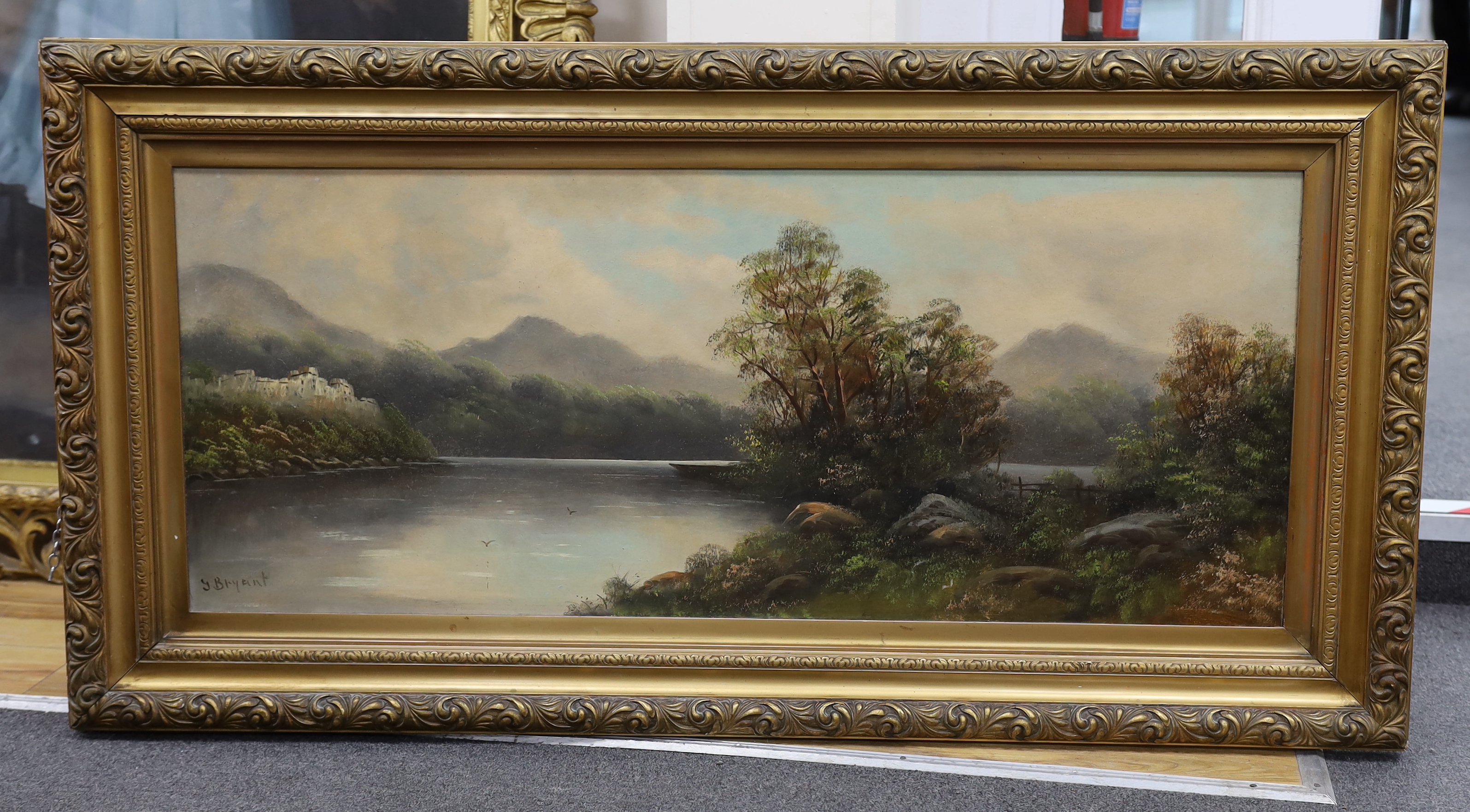 J Bryant (20th. C), panoramic oil on board, Riverscape, signed, 45 x 109cm